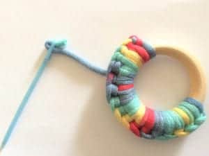 picture of needle and wood ring teether