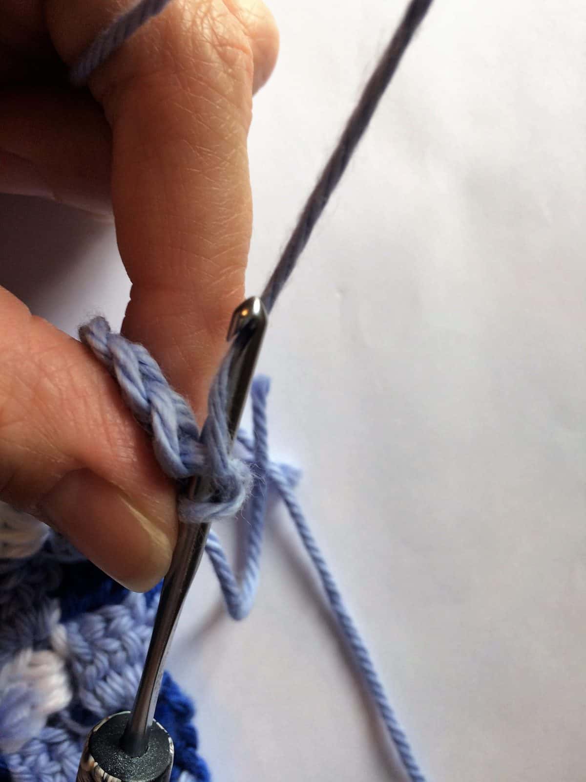 Yarn over hook for slip stitch.