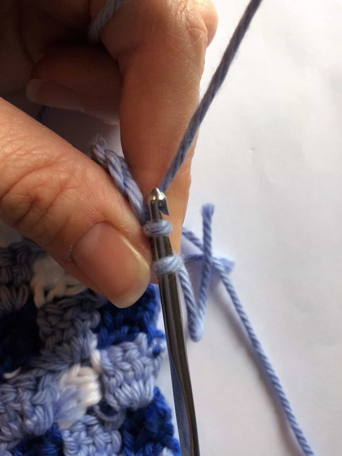 Two loops on hook for slip stitch.