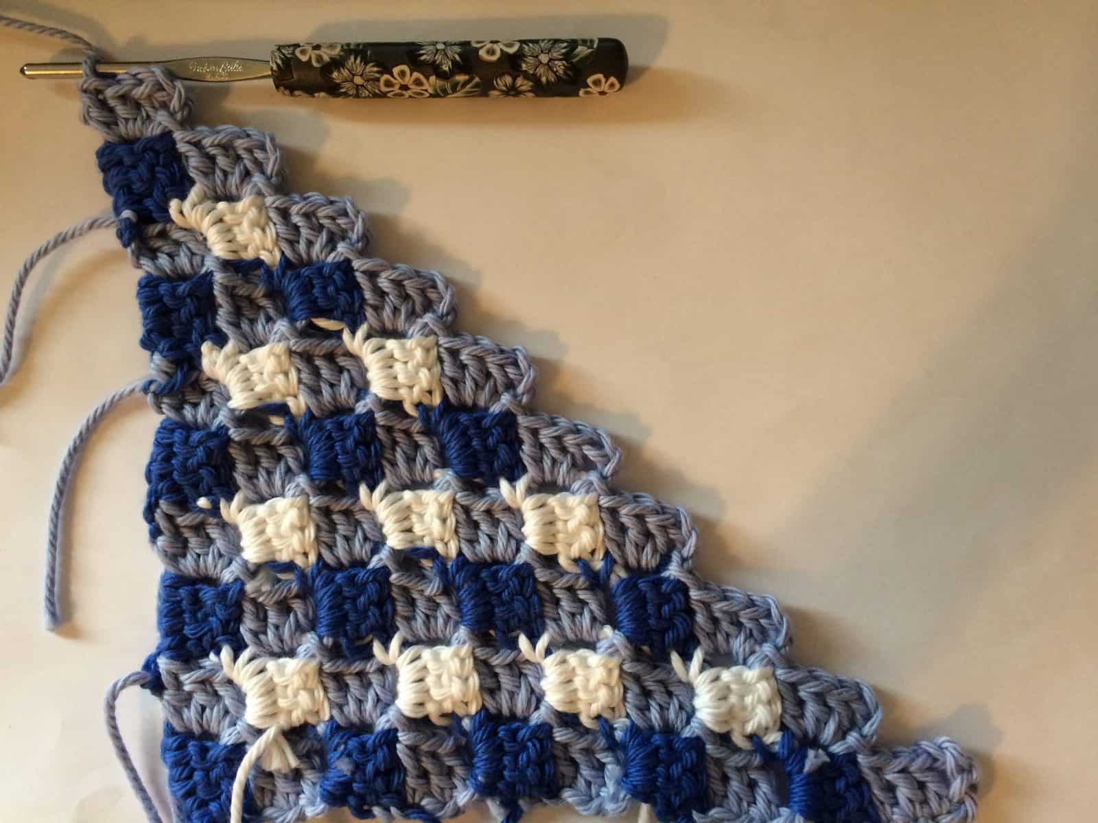 Crochet pillow case corner first 10 rows.