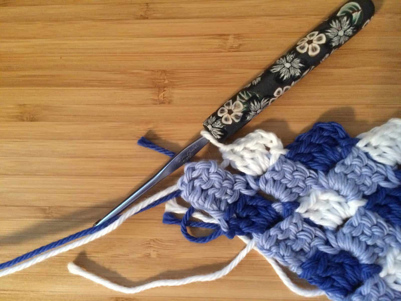 Crochet to end and turn.