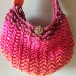 Close up of crochet texture on purse.