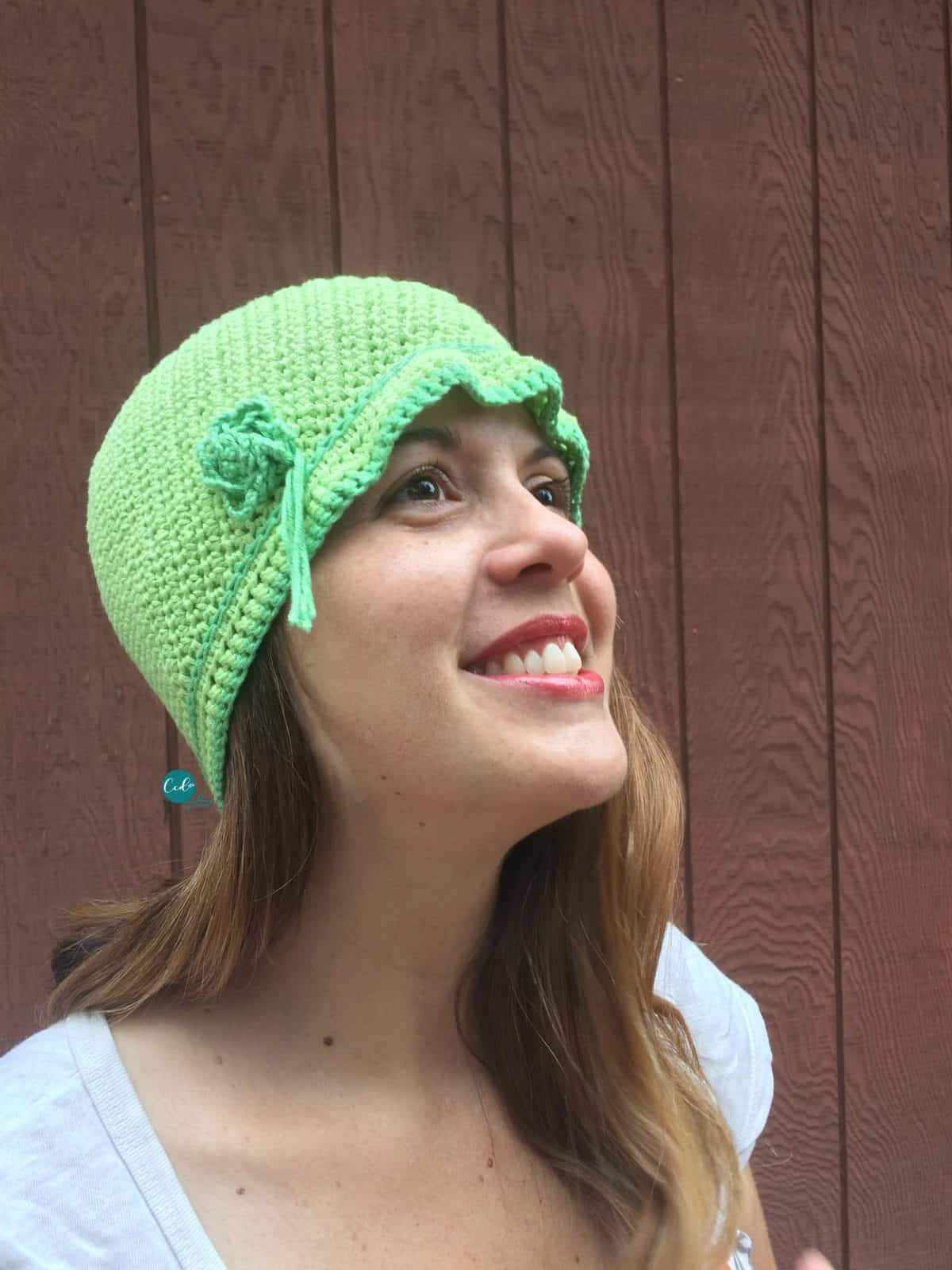 Woman in cloche style crochet cap.