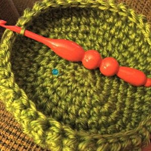 picture of green mini puff stitch hat worked up