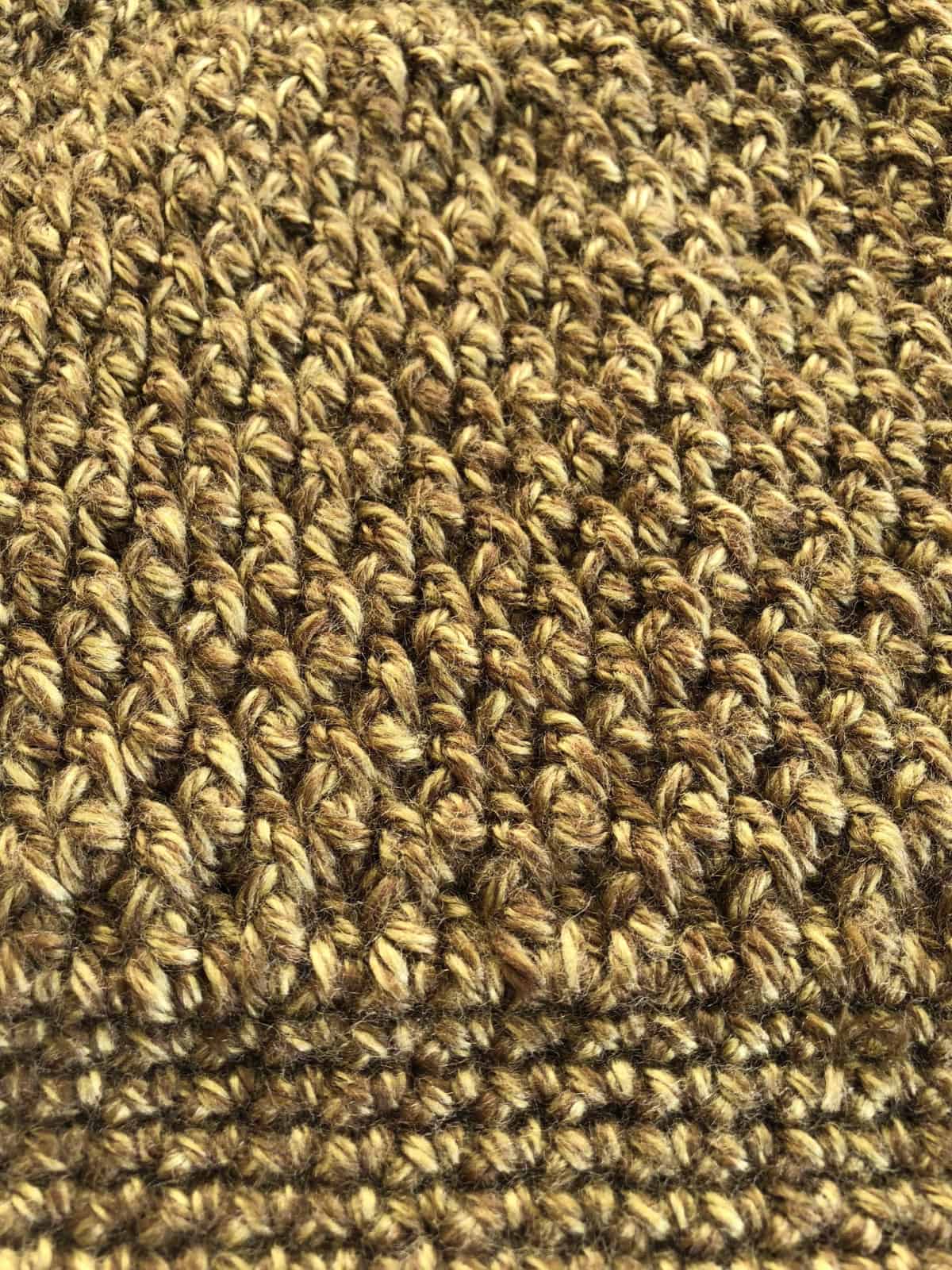 Close up of alternating post stitch texture.