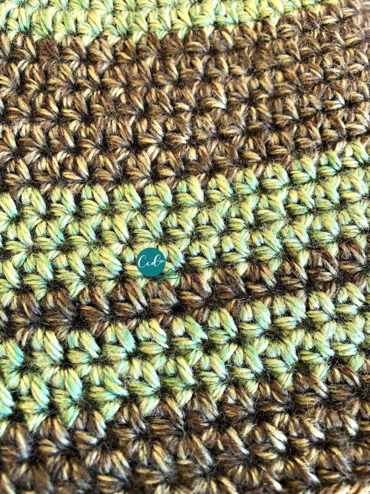 Up close of stripes on crochet beanie.