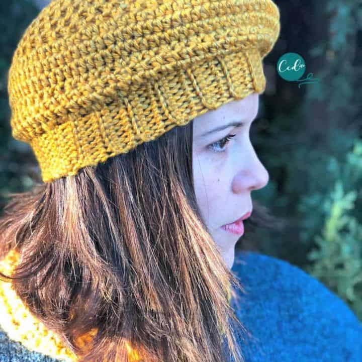 Woman in yellow crochet beret.