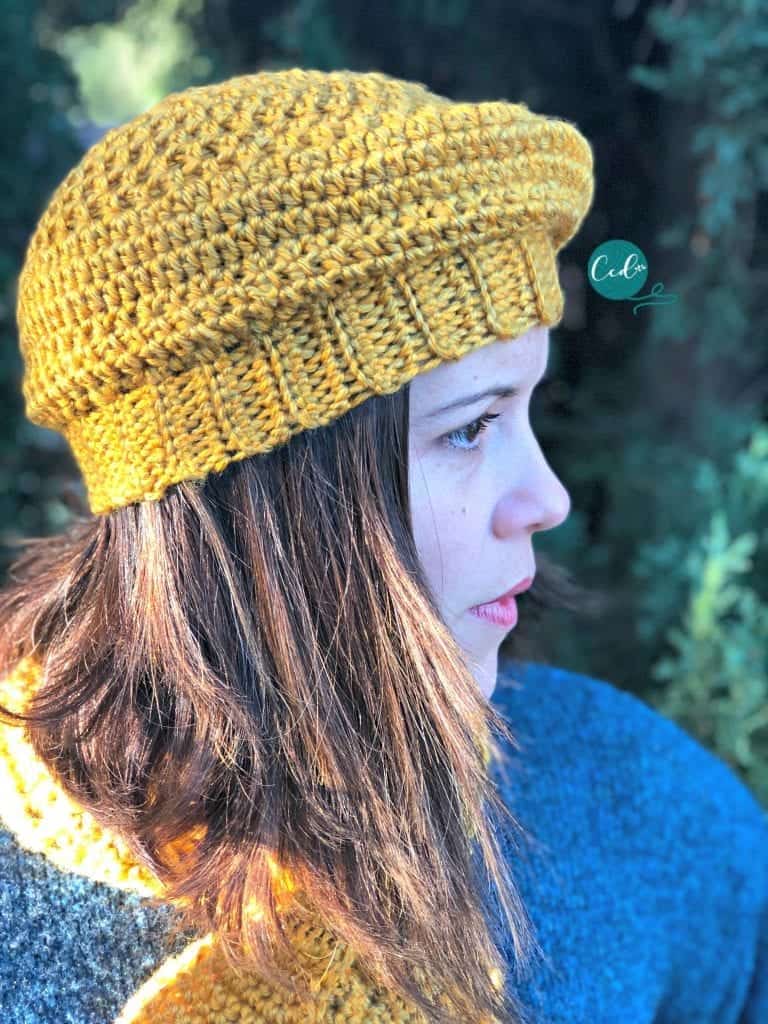 Woman in yellow crochet beret.