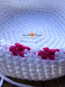 close up of pink hearts on first round of hat