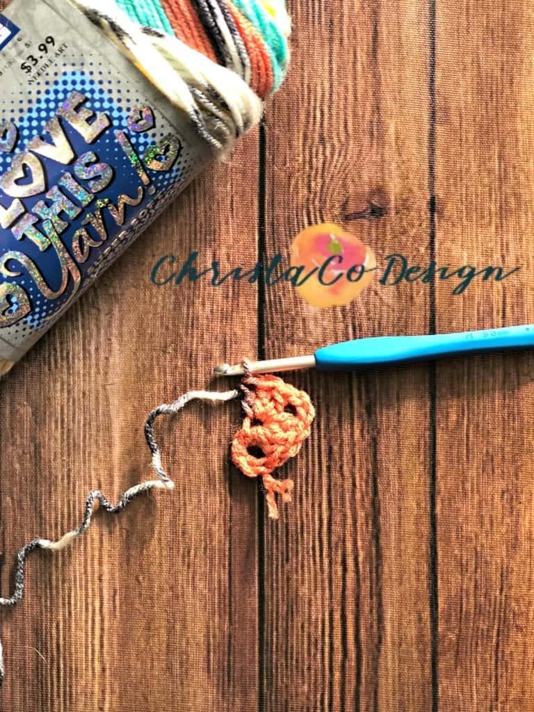 picture of how to crochet a triangle scarf