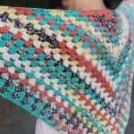 Back view of granny triangle shawl free crochet pattern.