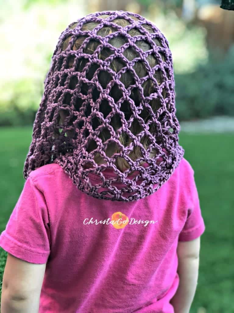 picture of draped crochet arches on girl's head
