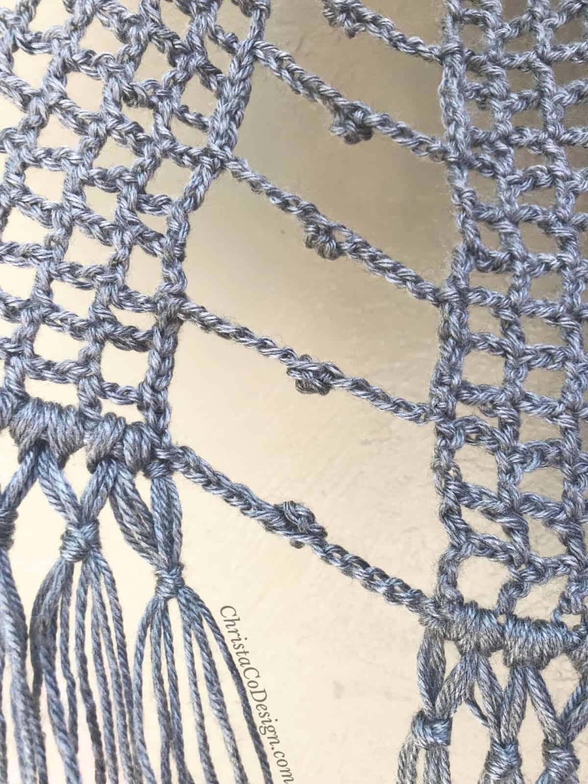 Open side detail on crochet vest.