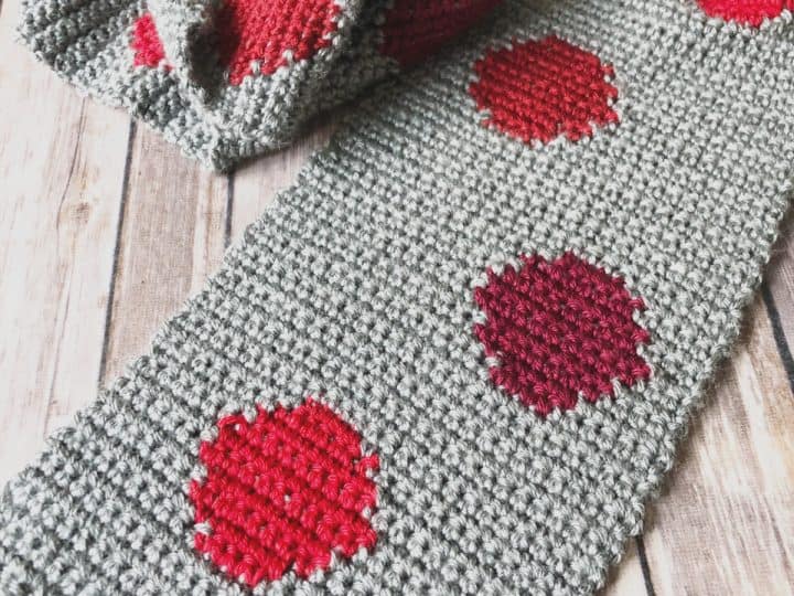 Ggrey scarf with red dots laid flat crochet pattern.