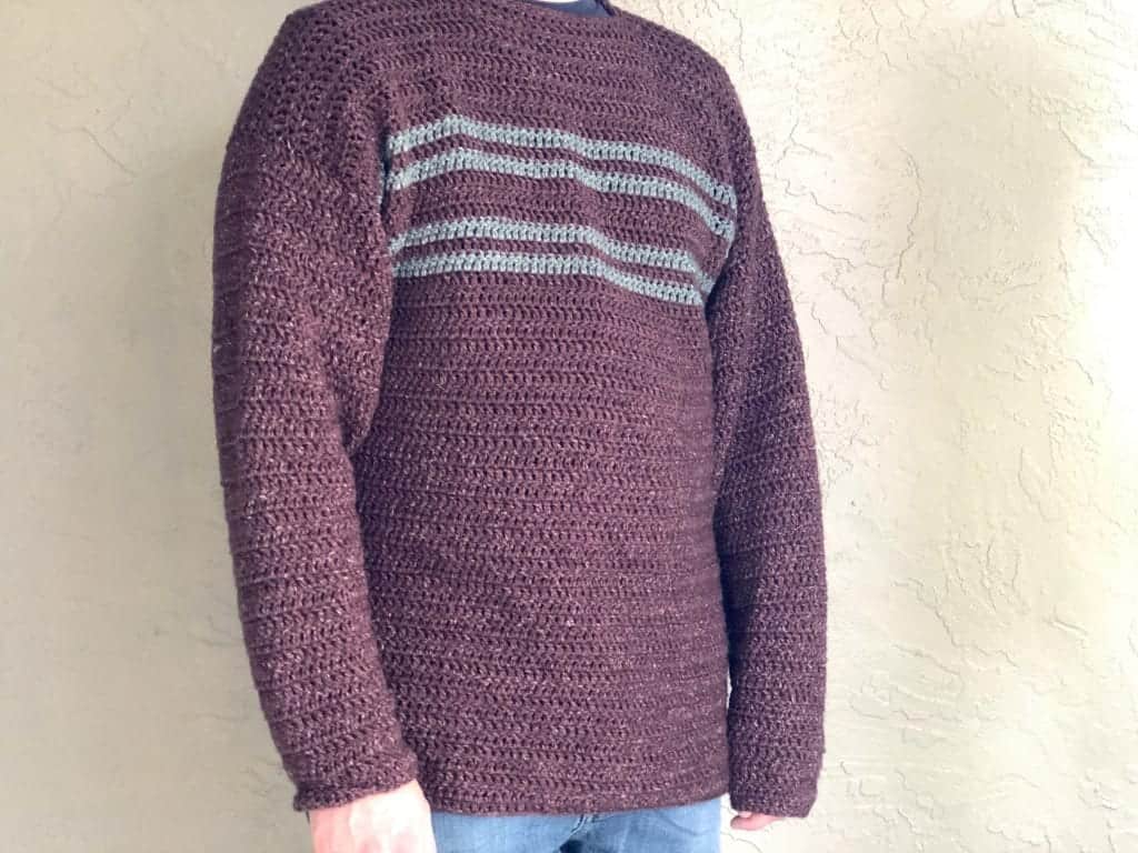 Burgundy and grey striped sweater on man.