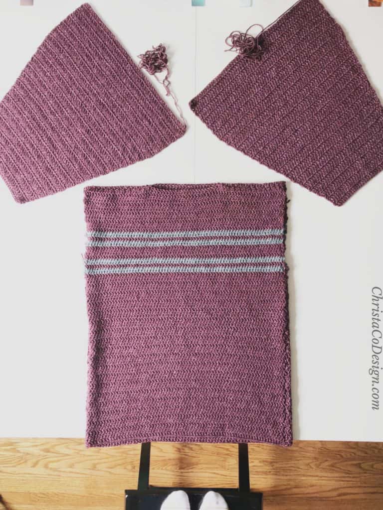 picture of sweater panels seamed with sleeve pieces separate