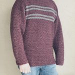 Man wearing striped crochet sweater burgundy grey stripes.