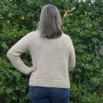 Back view of crochet cardigan eyelet detail on trim.