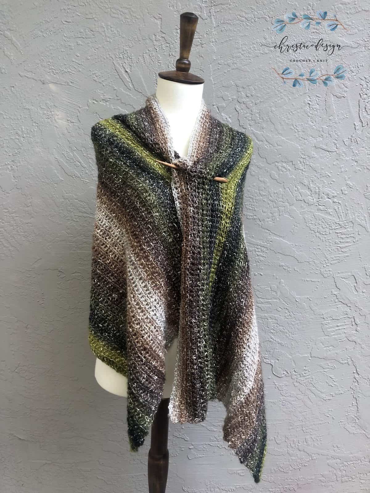 picture of crochet wrap with wood pin