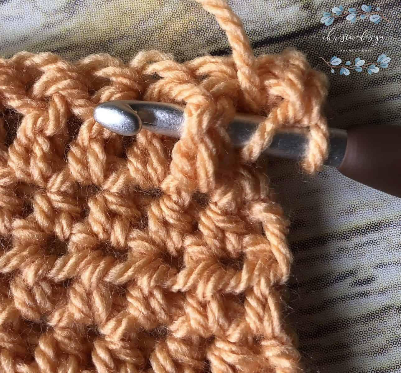picture of orange yarn crochet tutorial for ribbing step 1