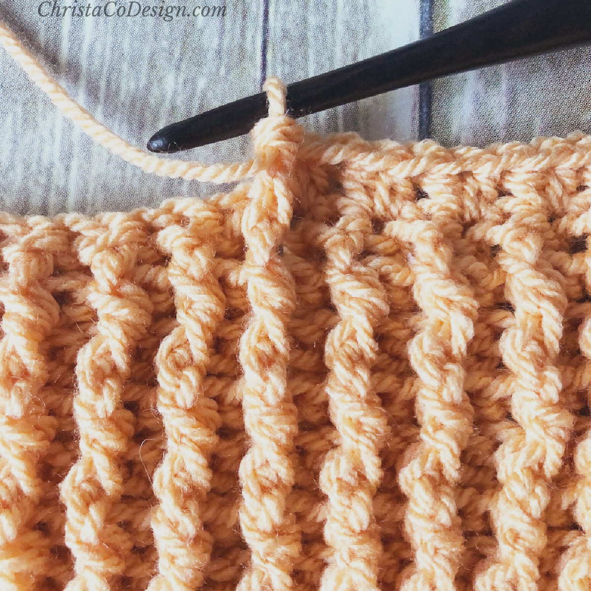 Ribbing stitches start for ending edge of blanket.