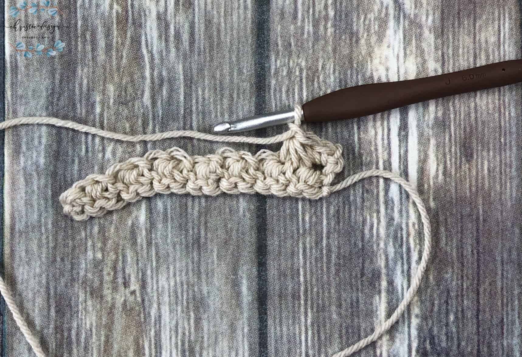 picture of first trinity stitch in row 2