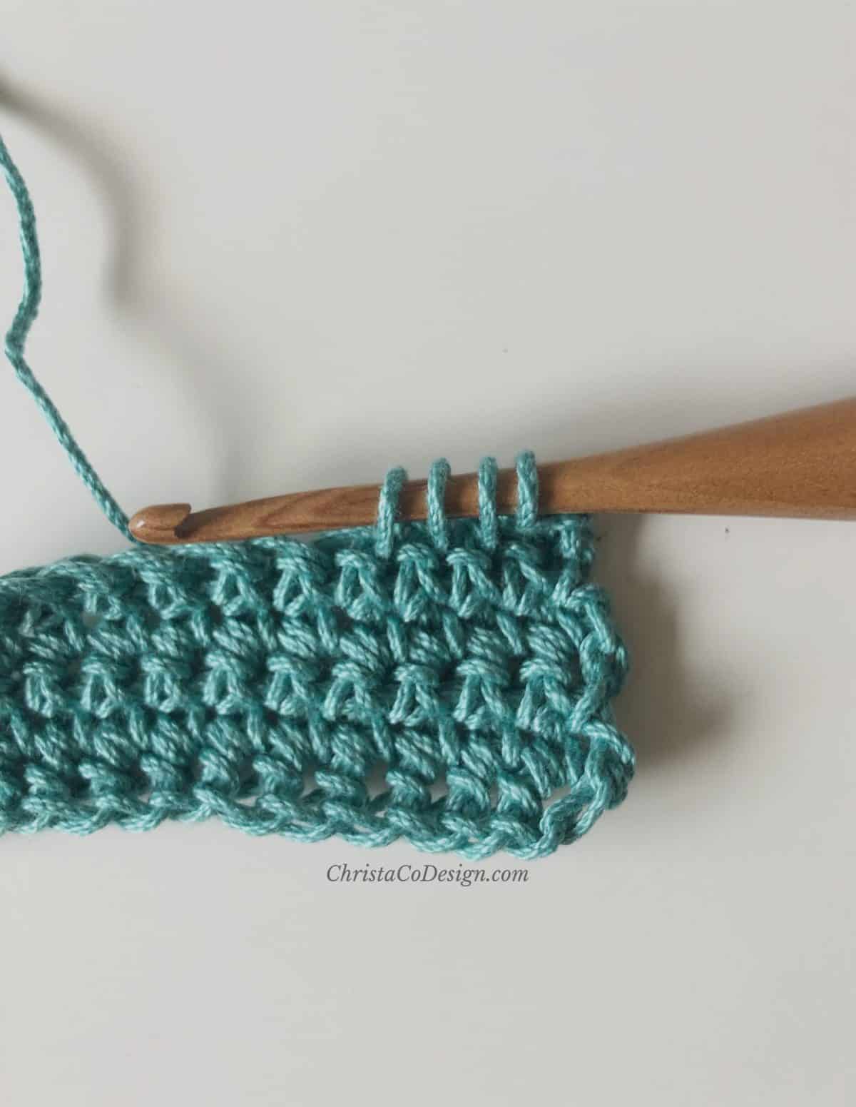 picture of teal swatch with 4 loops on crochet hook sc3tog tutorial