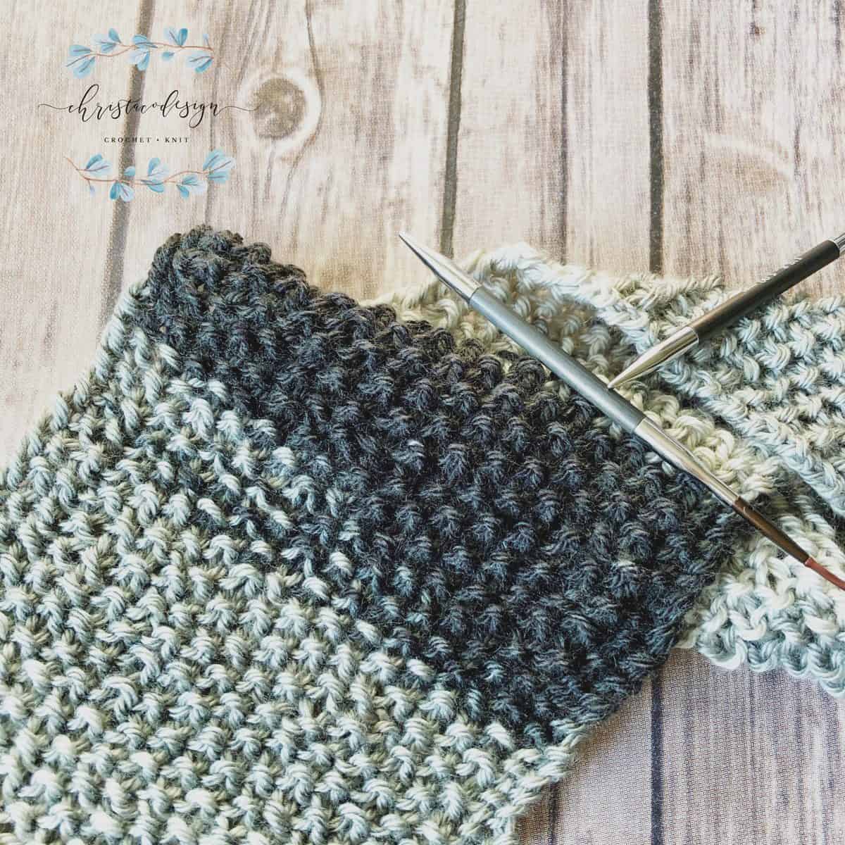 picture of textured knit scarf on knitting needles