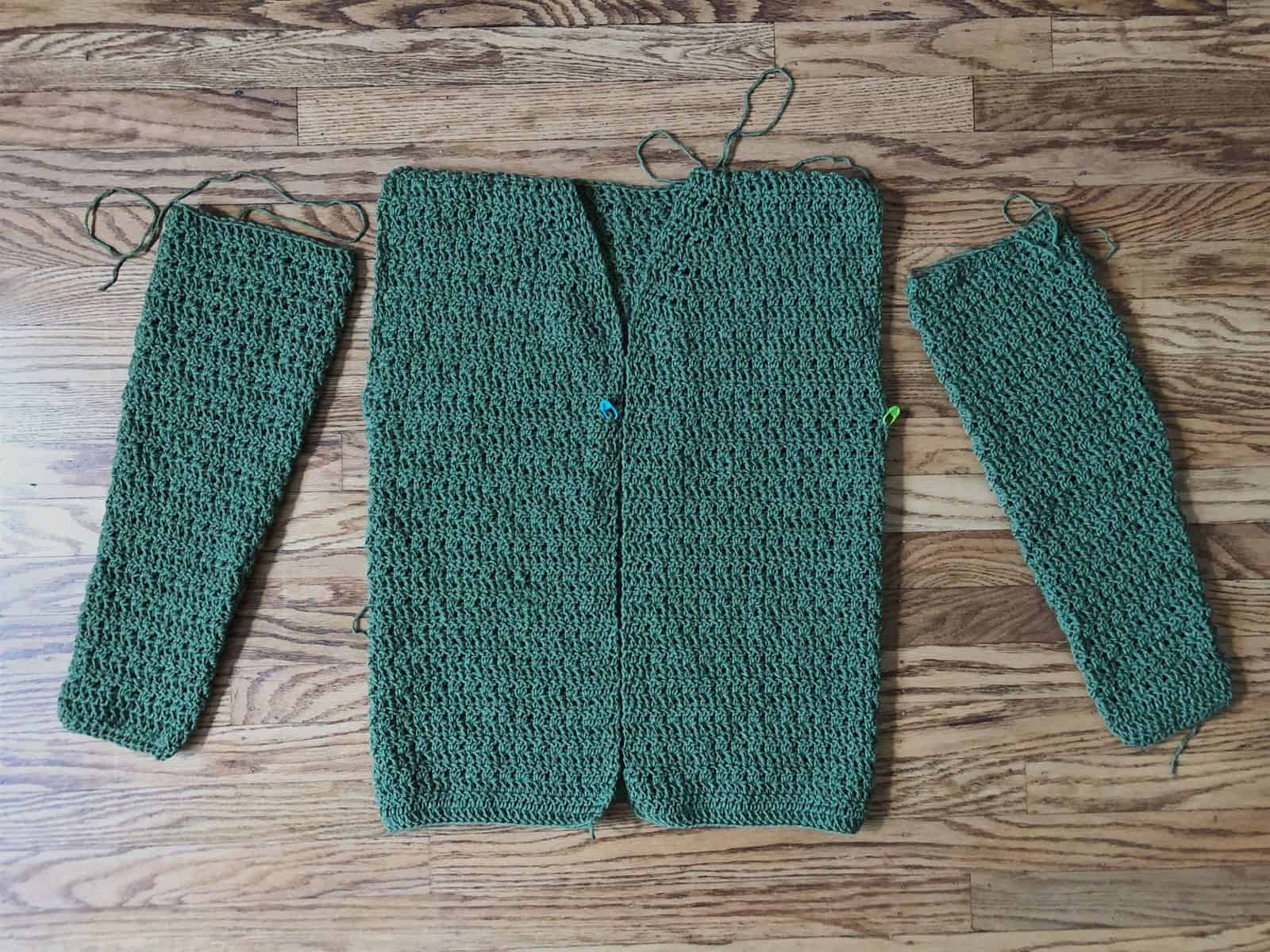 Crochet cardigan with sleeves ready to seam on.