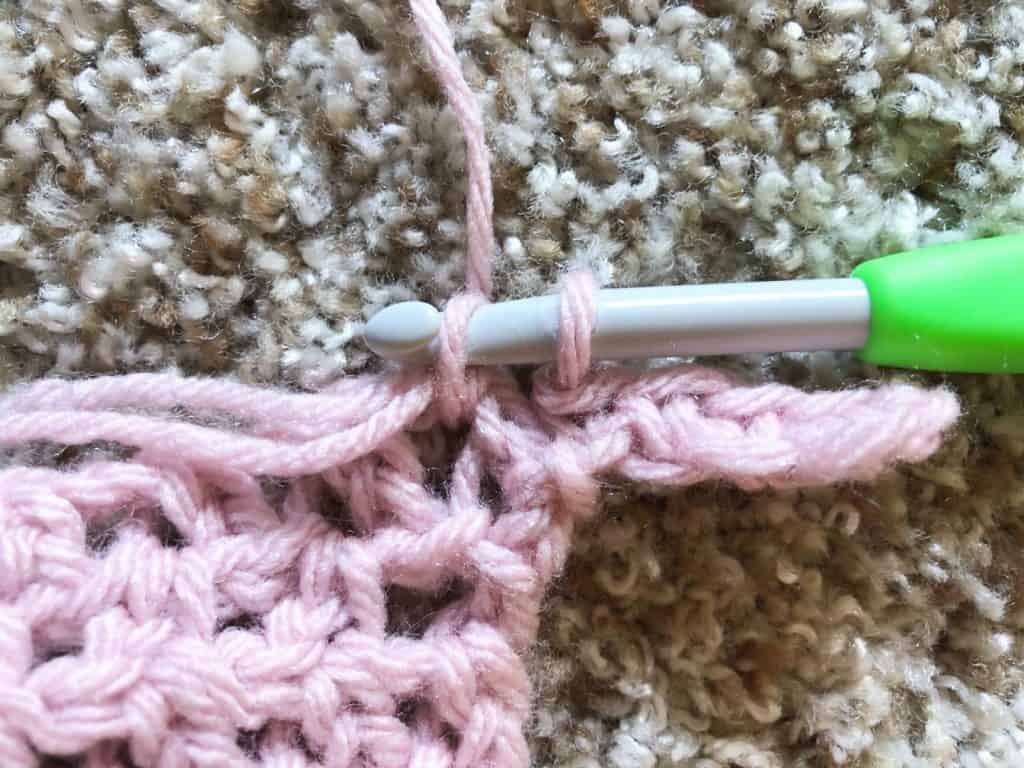 Sc to hem, 2 loops on hook.