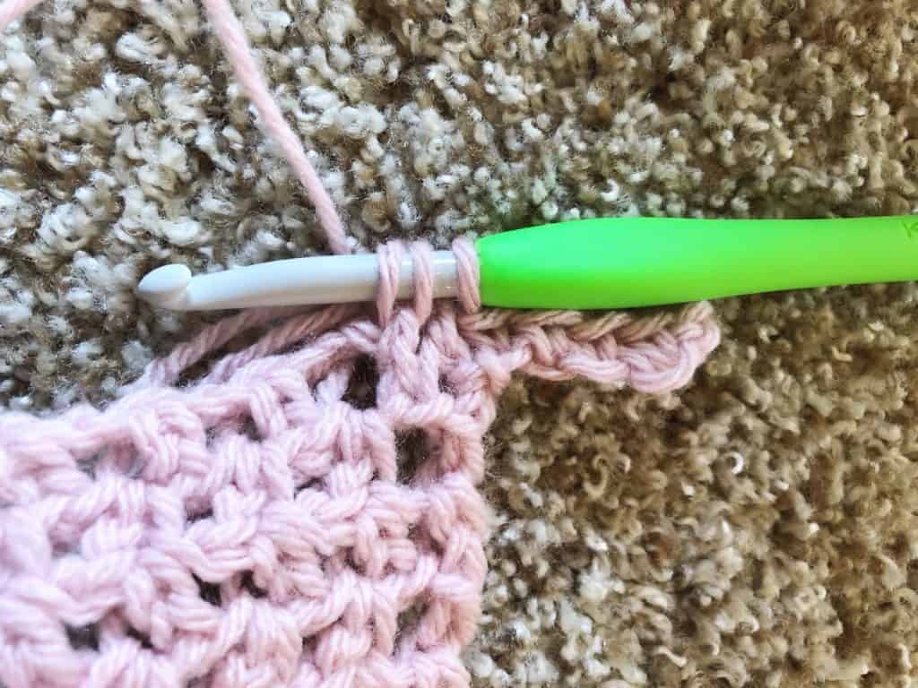 Insert hook in next st and yarn over to join.