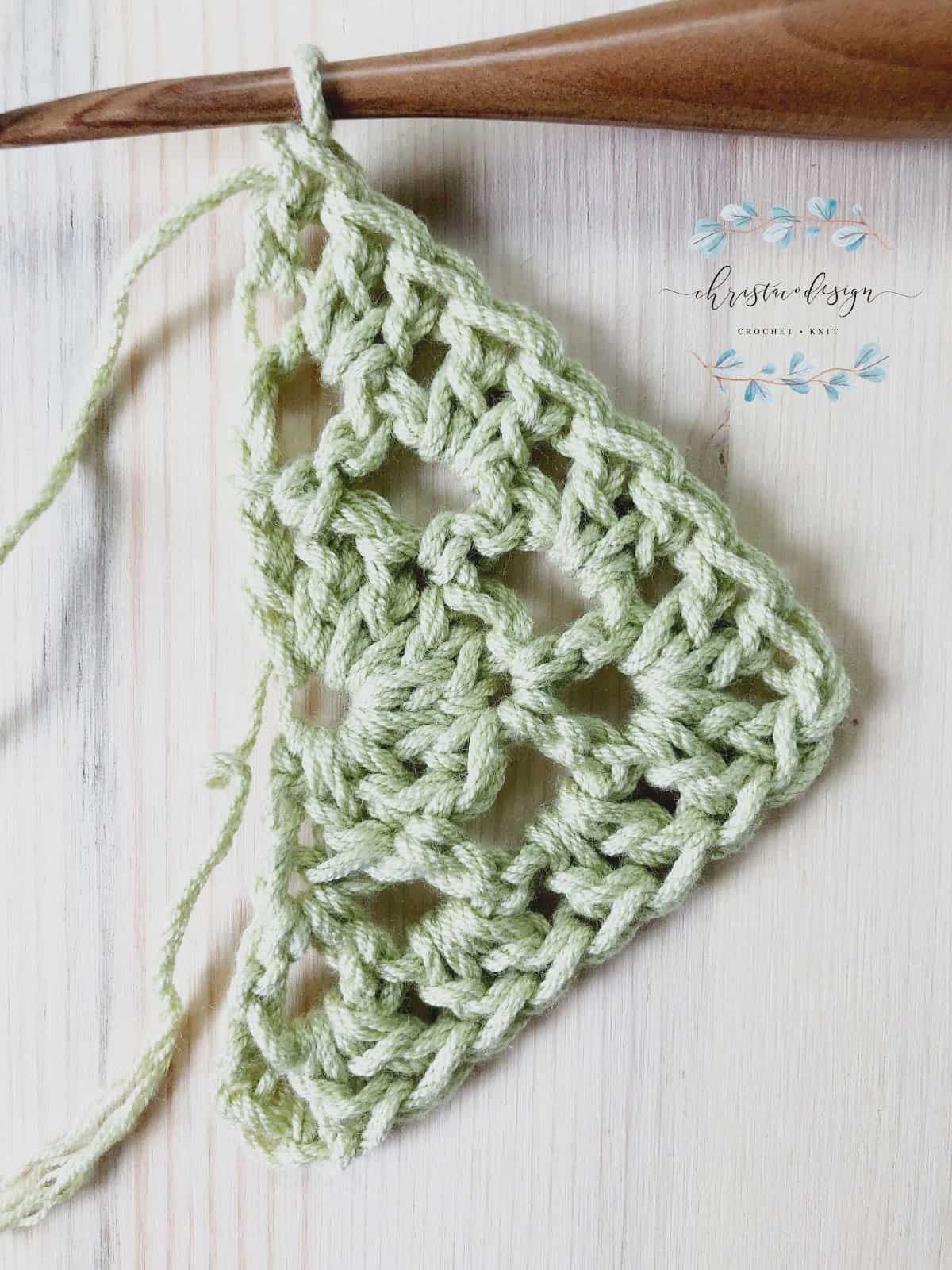 Row 3 lilla triangle shawl free crochet pattern.