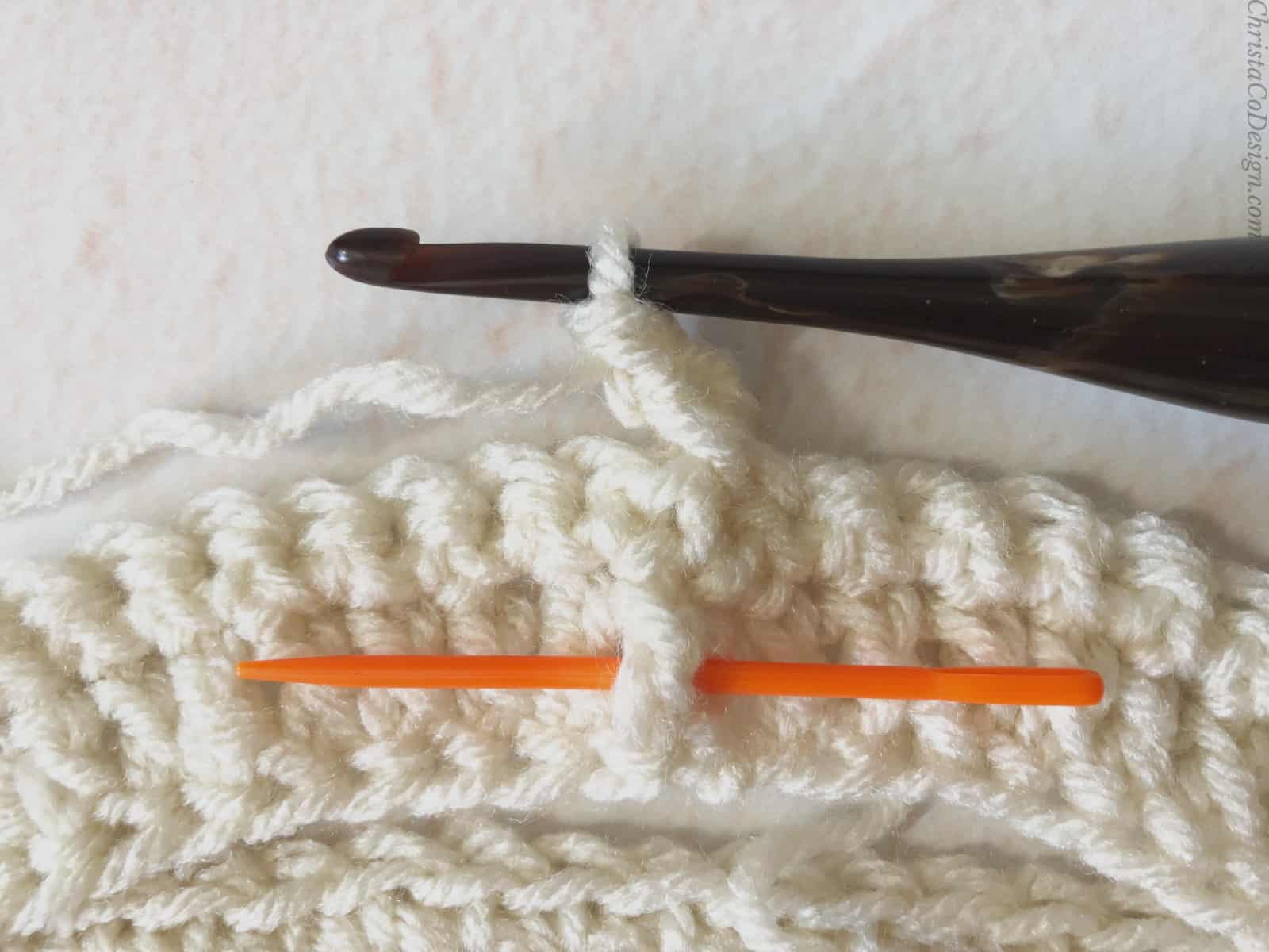 picture of where to insert crochet hook labeled with needle alpine stitch tutorial