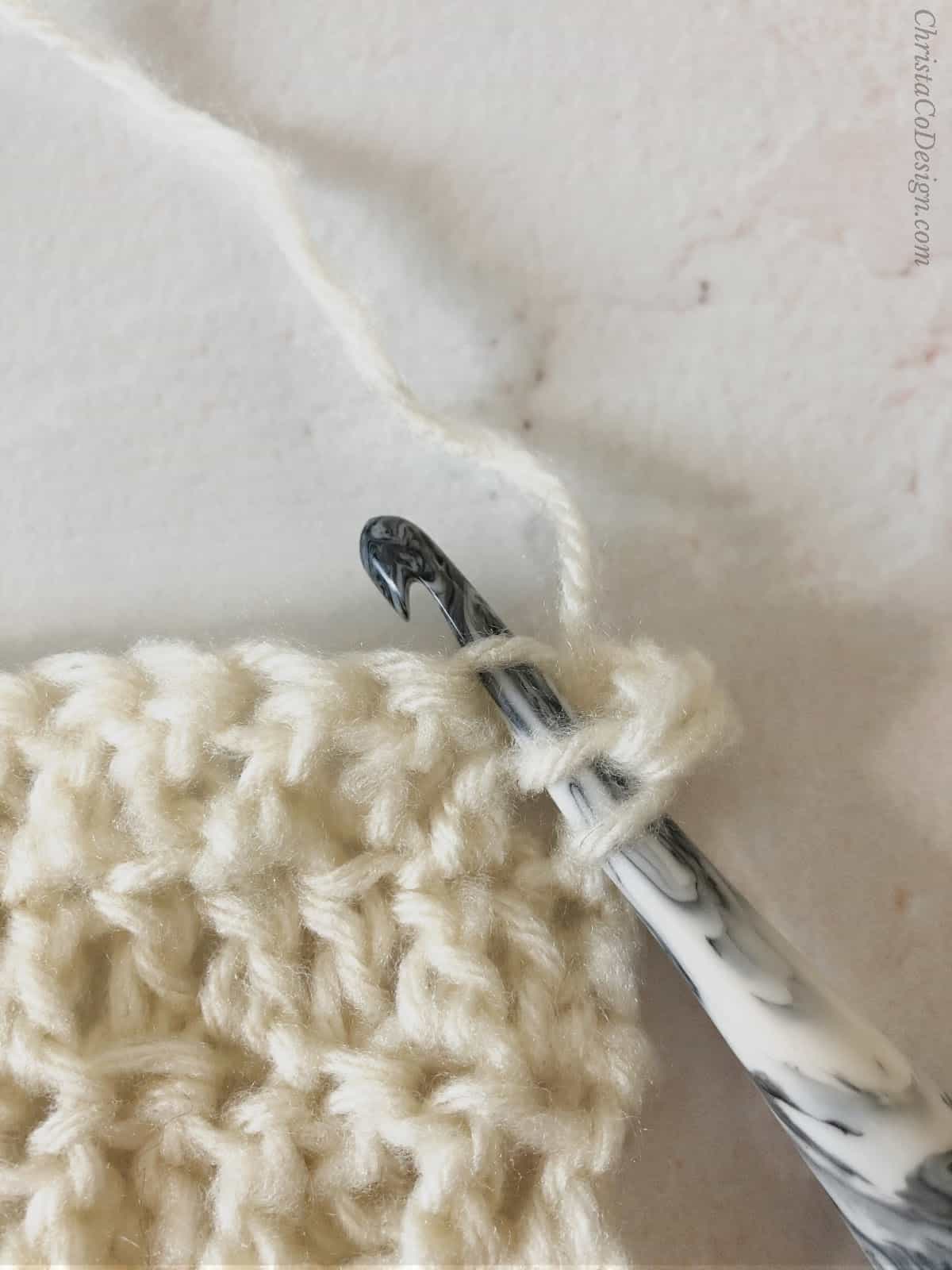 picture of inserting crochet hook into front loop of stitch