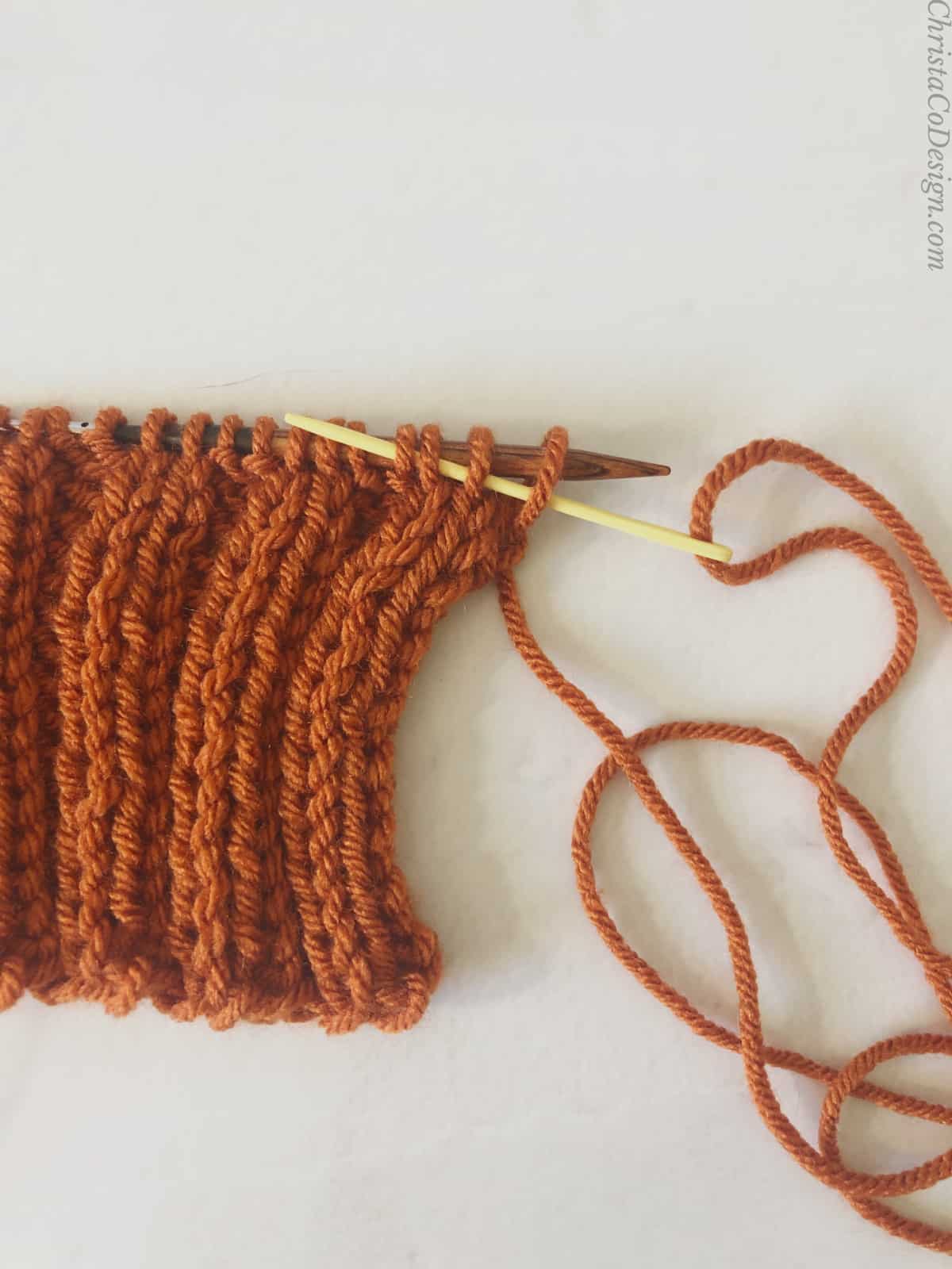 picture of needle weaving in tail knit pumpkin