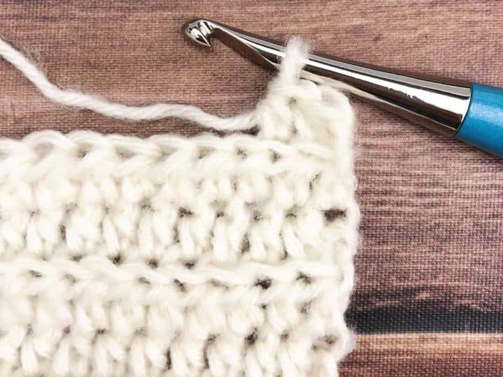 Swatch in half double crochet in back loop only in white.
