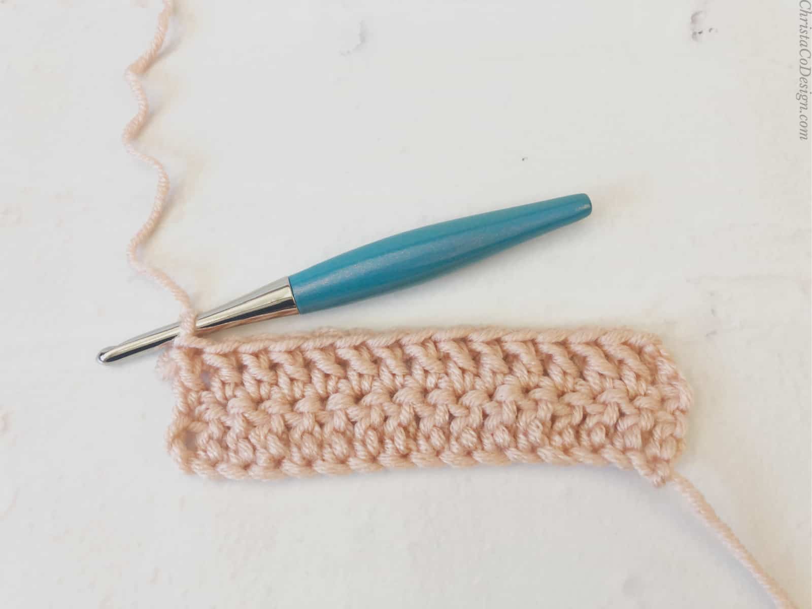 2 rows of double crochet in pink.