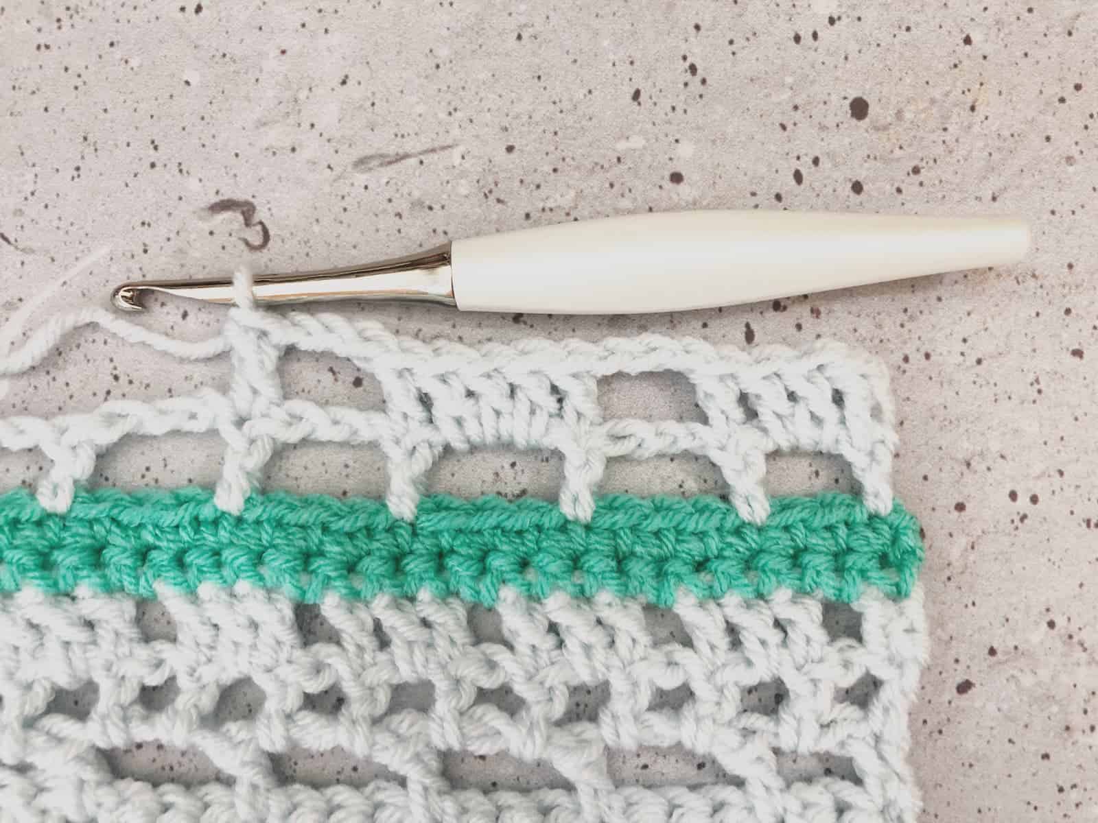 Crochet blocks starting row 16.