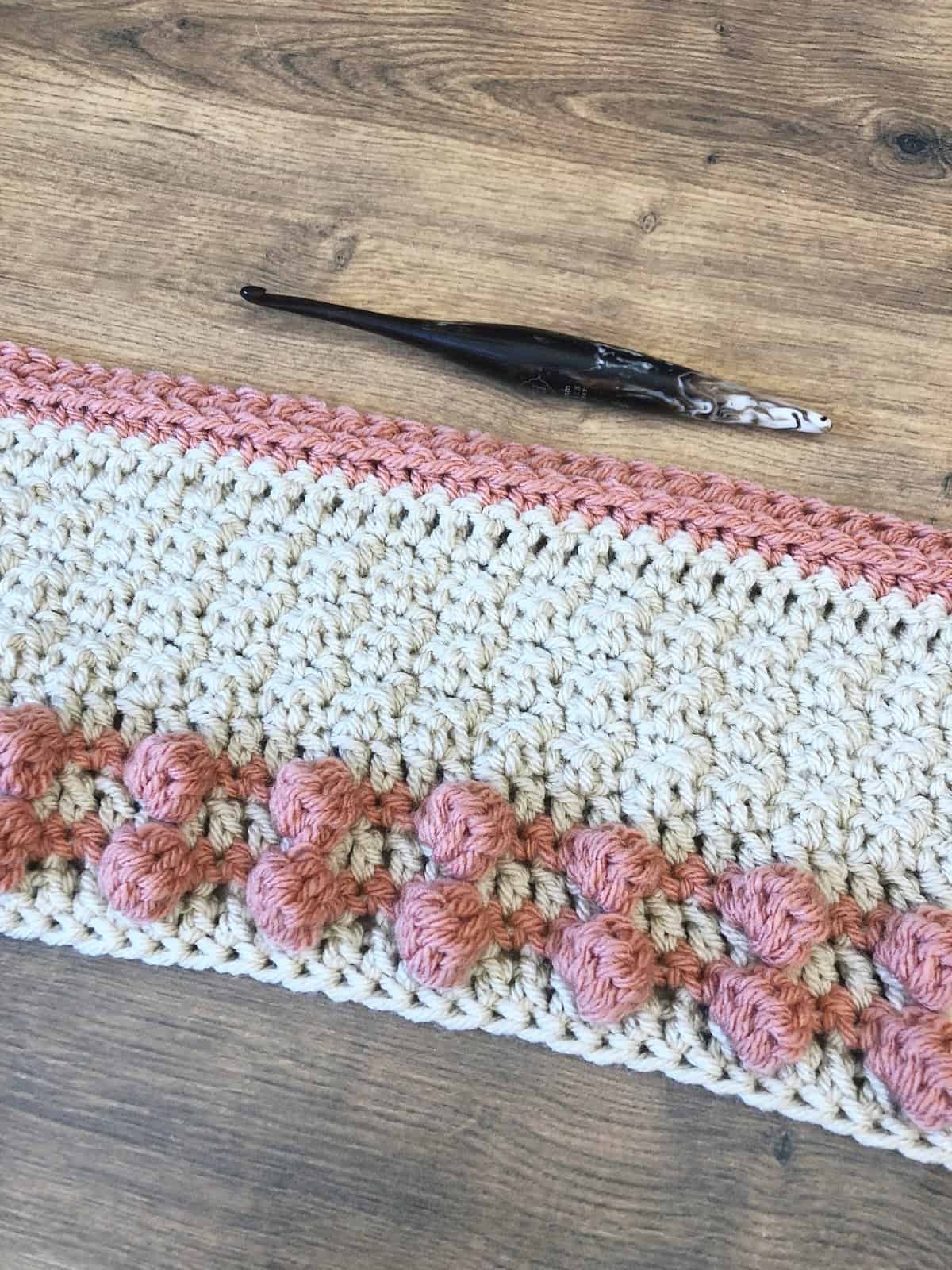 Progress of shawl with stripes and texture.