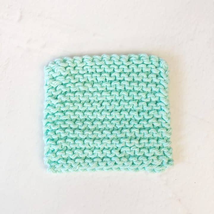 Mint colored square knit scrubby.