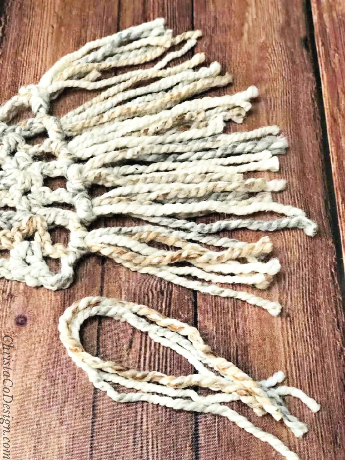 Chunky yarn ready to add to scarf fringe.