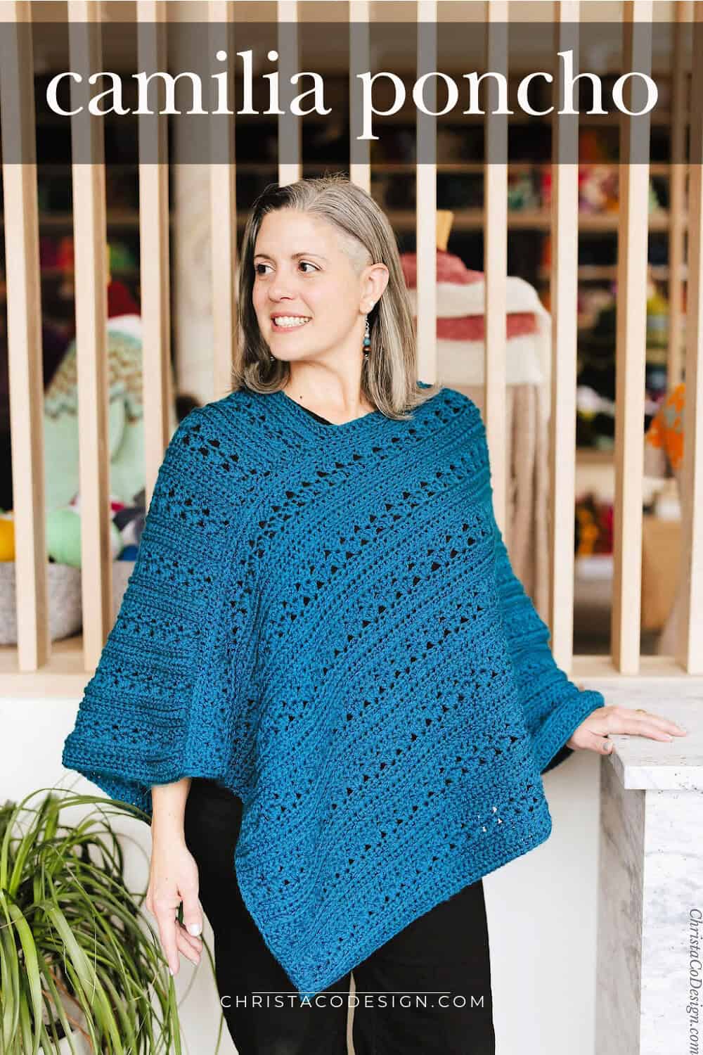 Woman in blue crochet poncho.