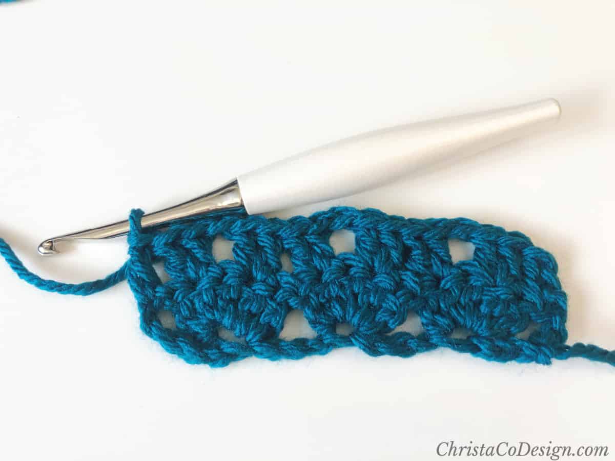 Crochet scarf tutorial for row 2 in red heart soft yarn.