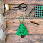 Knit Christmas tree with knitting notions.