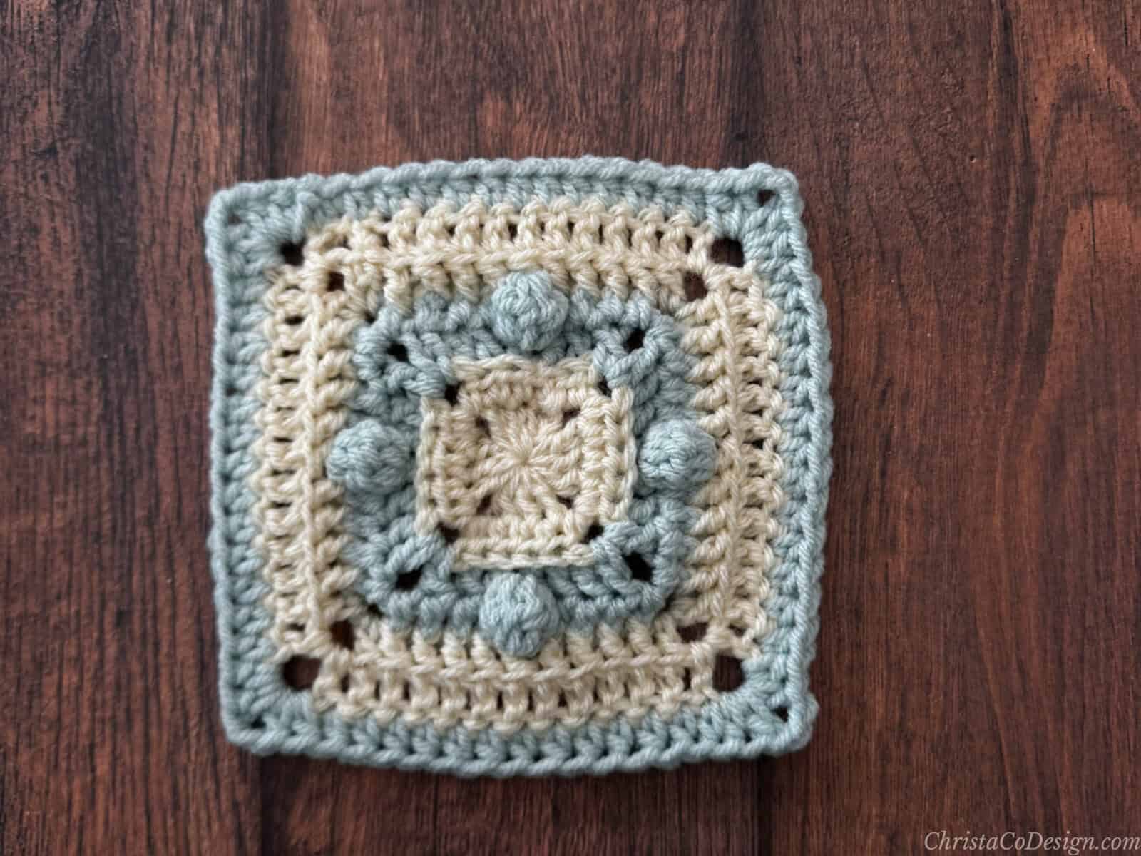 6 inch blanket square in blue and white.