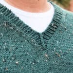 Close up of knit v-neck ribbing.