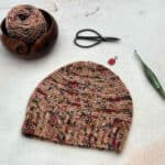 Crochet beanie flat with notions.