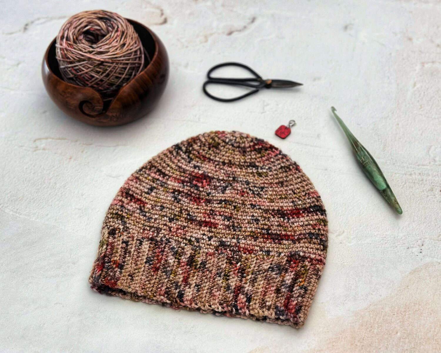 Crochet beanie flat with notions.