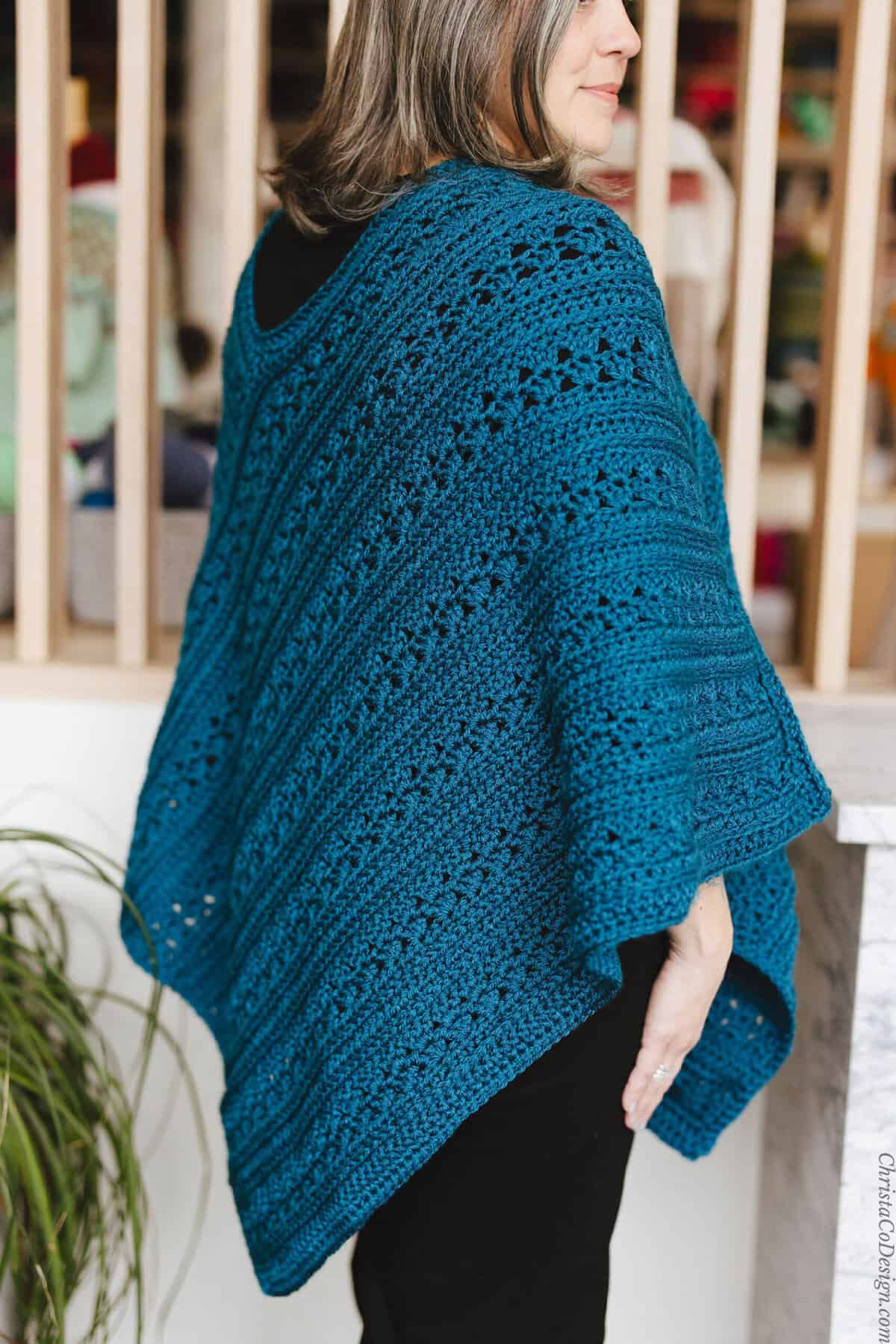 Back view of crochet poncho.