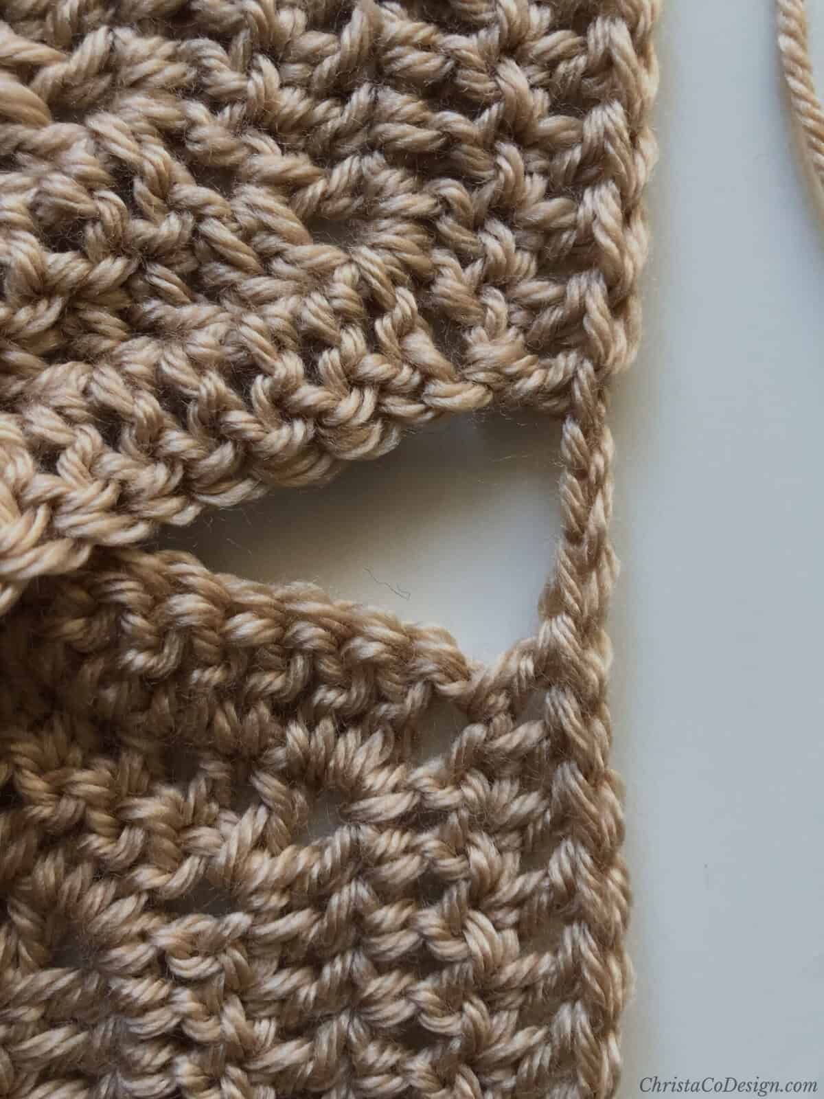 Close up of chains at armhole.